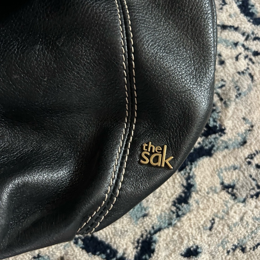 Black adjustable leather crossbody bag theSak